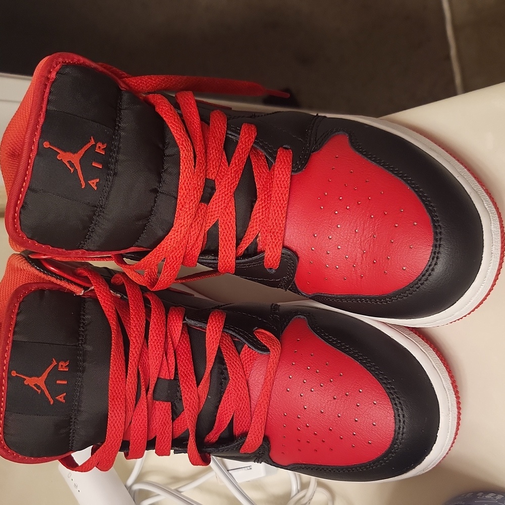 Black and red air jordans size 7 fairly New